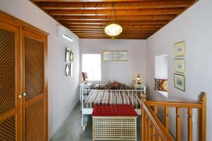 Postel nebo postele na pokoji v ubytování Casa Lindos