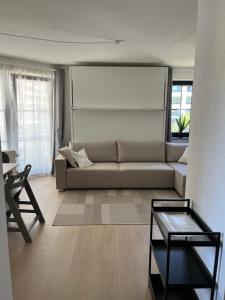 Posezení v ubytování Haus Titania Wohnung Meerblick