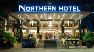 a northwegian hotel is lit up at night at Northern Saigon Hotel in Ho Chi Minh City