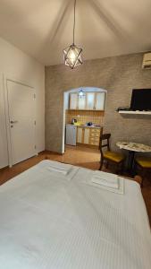 Postel nebo postele na pokoji v ubytování LAV Apartments