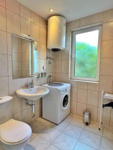 Koupelna v ubytování LAV Apartments