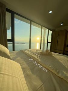 Postelja oz. postelje v sobi nastanitve Sunrise Gurney Seaview [無敵日出海景]