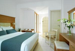 Postel nebo postele na pokoji v ubytování Coriva Beach Hotel & Bungalows