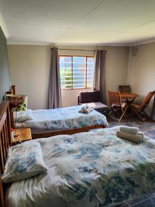 Llit o llits en una habitació de Sky Cottage