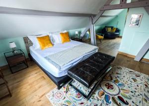 a bedroom with a large bed in a room at Chambres d'hotes - B&B Soulac 23 in Soulac-sur-Mer