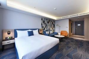 Ліжко або ліжка в номері Fullon Poshtel - Kaohsiung