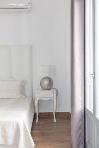 Łóżko lub łóżka w pokoju w obiekcie Hotel Star Santorini