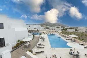 arial view of a hotel pool with chairs and umbrellas at Hotel Star Santorini in Megalokhori