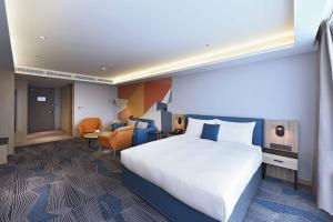 Ліжко або ліжка в номері Fullon Poshtel - Kaohsiung