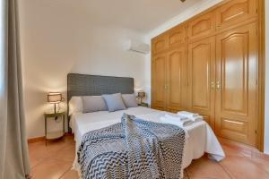 Łóżko lub łóżka w pokoju w obiekcie Villas Guzman - BELLISSIMA