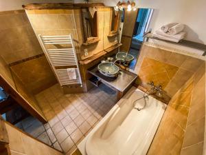 an overhead view of a bathroom with a sink at La Fernande in Baratier