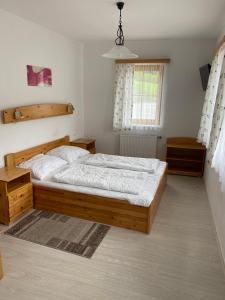 Voodi või voodid majutusasutuse Waldschlössl Gasthof toas