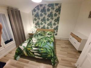 Postel nebo postele na pokoji v ubytování residence de l'évèché 5