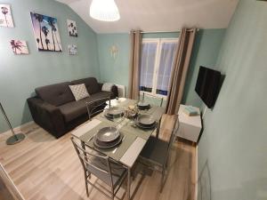 TV a/nebo společenská místnost v ubytování residence de l'évèché 5