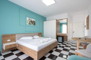 Postel nebo postele na pokoji v ubytování Compas Boutique Hotel + 37 fotografií