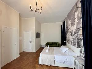 Postel nebo postele na pokoji v ubytování Be Your Home - Guest House Fuori Dal Porto