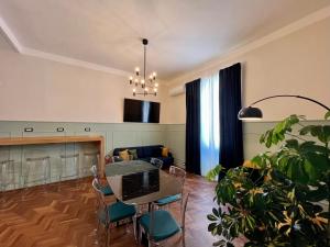 TV a/nebo společenská místnost v ubytování Be Your Home - Guest House Fuori Dal Porto