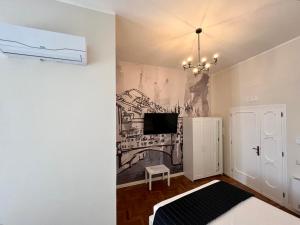 TV a/nebo společenská místnost v ubytování Be Your Home - Guest House Fuori Dal Porto