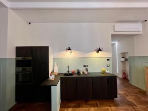 Kuchyň nebo kuchyňský kout v ubytování Be Your Home - Guest House Fuori Dal Porto