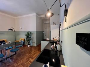 Kuchyň nebo kuchyňský kout v ubytování Be Your Home - Guest House Fuori Dal Porto