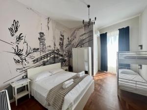 Postel nebo postele na pokoji v ubytování Be Your Home - Guest House Fuori Dal Porto