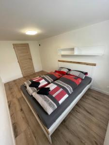 Postel nebo postele na pokoji v ubytování Apartmány Pod Chlumem