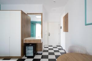 Postel nebo postele na pokoji v ubytování Compas Boutique Hotel