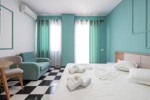 Postel nebo postele na pokoji v ubytování Compas Boutique Hotel