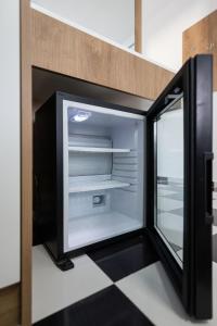 Kuchyň nebo kuchyňský kout v ubytování Compas Boutique Hotel