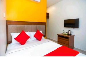 Ein Bett oder Betten in einem Zimmer der Unterkunft Hotel Jerai Ct Inn