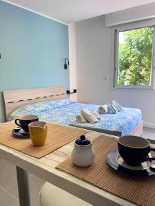 Postel nebo postele na pokoji v ubytování Gloria Maris Apartment + 10 fotografií