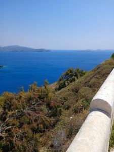a view of the ocean from a pipeline at Traditional house under the castle in Astypalaia