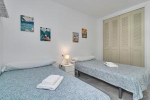 Posteľ alebo postele v izbe v ubytovaní Las Rosas House + 18 fotografií