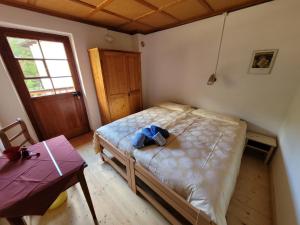 Postel nebo postele na pokoji v ubytování Ristoro Buril
