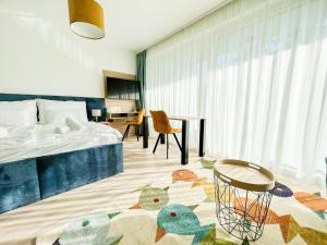 Гостиная зона в Villa Bauhaus Wellness Apartments 207 - PetitePlage