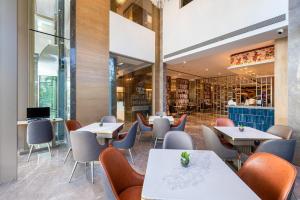 Posezení v ubytování Express Inn The Business Luxury Hotel