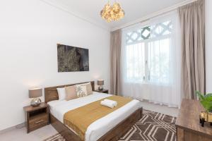Postel nebo postele na pokoji v ubytování Hot OFFER! Spacious 1BR Palm Jumeirah with Riva Beach Access