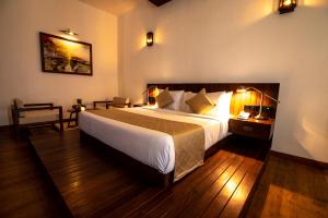 Ένα ή περισσότερα κρεβάτια σε δωμάτιο στο The Rockwall Boutique Hotel Bentota
