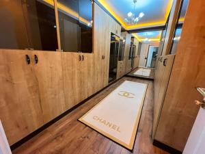 a locker room with a sign that says channel at Квартира Versace 3+1 в Анталии in Hurmaköy