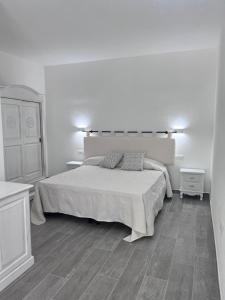 Postel nebo postele na pokoji v ubytování Sa Jacca Albergo Rurale