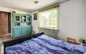 Ένα ή περισσότερα κρεβάτια σε δωμάτιο στο Awesome Home In Osby With Kitchen