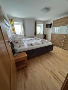 Postel nebo postele na pokoji v ubytování Babsi Appartments - leben am Land