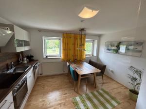 Kuchyň nebo kuchyňský kout v ubytování Babsi Appartments - leben am Land