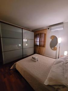 Ein Bett oder Betten in einem Zimmer der Unterkunft VERDESOLE HOUSE
