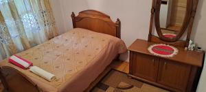 Voodi või voodid majutusasutuse Guest house Lailashi toas