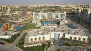 an aerial view of a city with buildings at Jewel Sport City and Aqua Park in Cairo