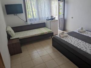 Postel nebo postele na pokoji v ubytování Цвета