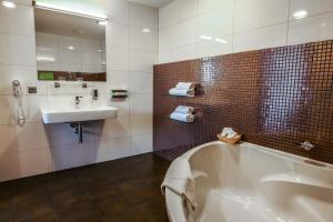Ένα μπάνιο στο Hotel Beroun Golf Club