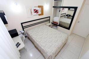 Кровать или кровати в номере DiRoma Resort / Splash e Acqua Park
