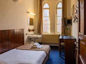 Postel nebo postele na pokoji v ubytování Guesthouse PoortAckere Ghent